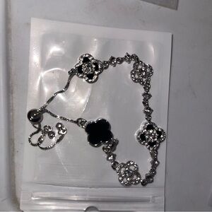 Elegant Silver and Black Floral Bracelet